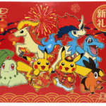 Spalvingas pokemonų figūrėlių rinkinys kalėdinėje dovanų pakuotėje, šventinis dekoras.
